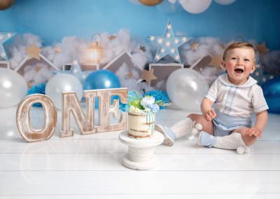 Baby boy at a cake smash photoshoot